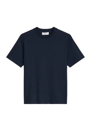 T-shirt bleu marine foncé uni à manches courtes et col rond, avec une étiquette blanche à l'intérieur du col.