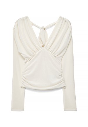 Blouse blanche à manches longues avec un profond décolleté en V, des détails de tissu froncé et un nœud à l'encolure arrière.