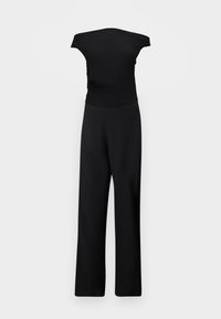 Combinaison noire sans manches avec jambes larges et corsage ajusté, présentée sur un fond gris clair uni.