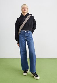 Converse CHUCK TAYLOR ALL STAR LUGGED HEEL PLATFORM WATERPROOF - Zapatillas altas - black/egret