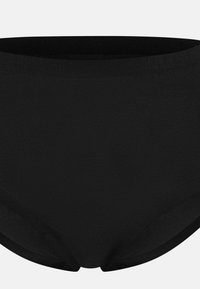 Mutande da donna nere a vita alta realizzate in tessuto morbido ed elastico. Presenta bordi lisci e un design senza cuciture per il massimo comfort.