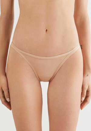 Nude mesh bikini brief with thin elastic bands, a low-rise cut, and smooth fabric texture, offering a minimal and comfortable design.
