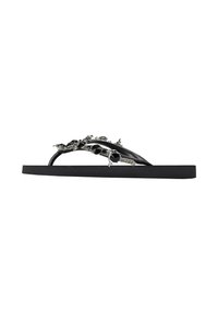 Black flip-flop with a textured sole, featuring embellished straps with metallic accents and decorative elements, providing a unique design.