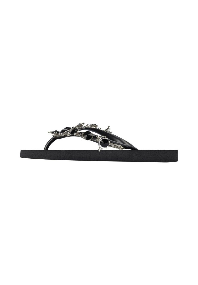 Black flip-flop with a textured sole, featuring embellished straps with metallic accents and decorative elements, providing a unique design.