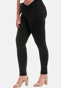 Elara STRETCH - Vaqueros pitillo - schwarz