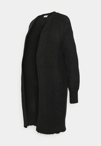 Svart öppet stickat kort med lös passform, med texturerade mönster och ribbade muddar. Nedtill finns en fransdetalj för en avslappnad finish.