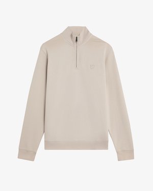 Beiger Langarm-Pullover mit halbem Reißverschluss am Kragen und weicher Textur. Verfügt über ein kleines, aufgesticktes Logo auf der Brust.