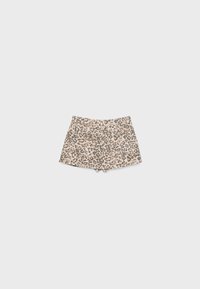 Shorts en imprimé léopard beige clair avec des taches marron foncé. Présente une taille ajustée et de légères ouvertures au niveau des jambes. Fabriqué en tissu doux.
