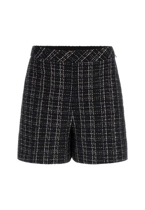 Zwart-witte geruite shorts van een gestructureerde stof. Kenmerkt zich door een hoge taille met een geweven band en zichtbare stiksels.