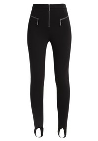 Leggins negros de material elástico, con un cierre frontal y dos bolsillos con cremallera. Asas en los tobillos para un ajuste seguro.