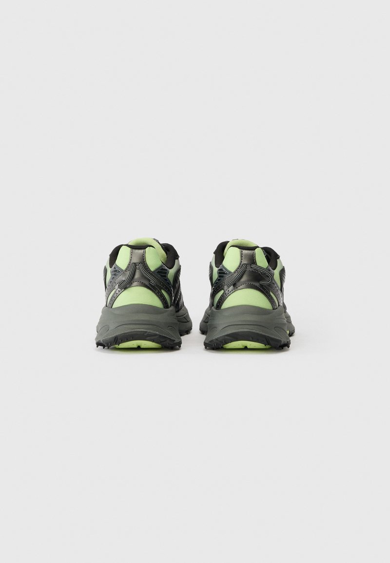 Pair of black and green athletic shoes shown from the back on a plain white background.