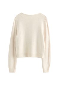 Maglione lavorato a maglia color crema con taglio corto, maniche lunghe e scollatura rotonda. Texture morbida e dettagli con polsini a coste.