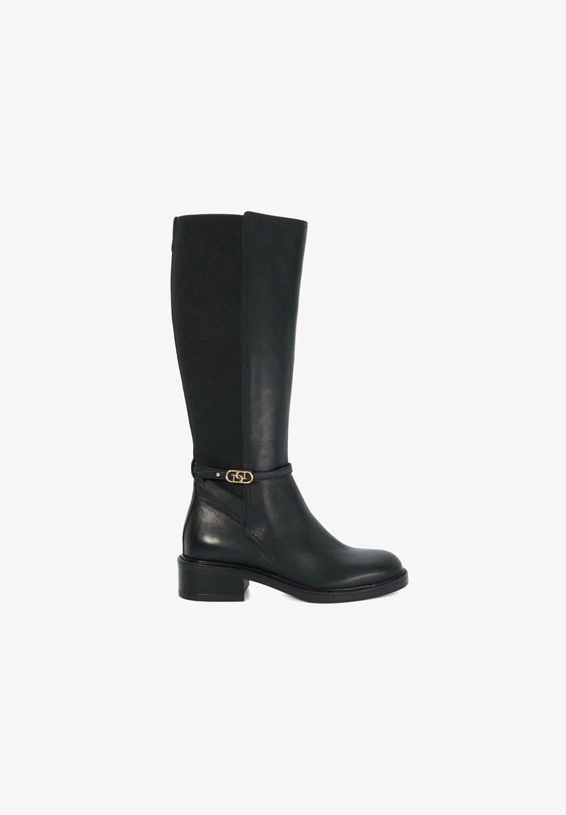 Bottes noires montantes avec un bout en cuir et une tige en tissu extensible. Présente un accent en métal doré autour de la cheville et un petit talon.