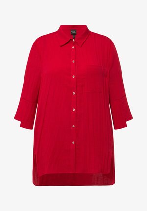 Rotes Hemd mit Kragen, langen Ärmeln, Knopfverschluss und einer Brusttasche. Aus einem leichten, strukturierten Stoff gefertigt.
