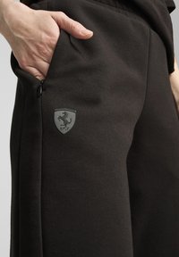 Puma SCUDERIA FERRARI STYLE - Träningsbyxor - black