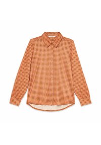 Blusa arancione a maniche lunghe con motivo a pois color viola scuro. Design con colletto, orlo curvo e chiusura frontale con bottoni.