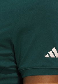 adidas Performance ULTIMATE TOUR TWIST - Piké - aurora ivy