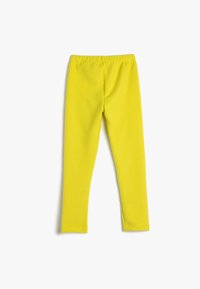 Gelbe Leggings aus einem weichen Stoff, mit einem schlichten Design, elastischem Bund und glatter Textur, ohne Muster oder Akzente.