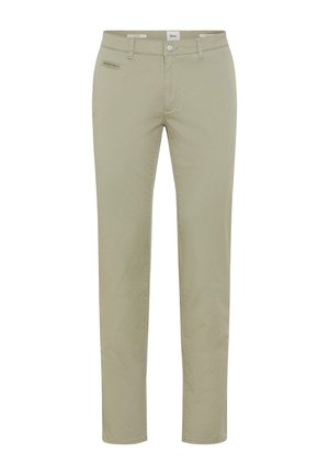 Schmal geschnittene beige Chinos mit vorderer Knopf- und Reißverschluss, Gürtelschlaufen und einer kleinen Reißverschlusstasche auf der rechten Seite.