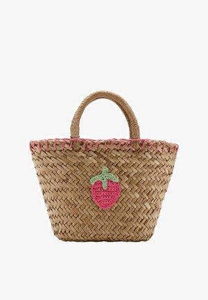 Woven straw handbag with rounded handles, pink stitching along the top edge, and a crocheted strawberry decoration on the front.