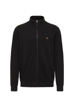 Giacca nera con zip, realizzata in tessuto morbido, dotata di un alto colletto, due tasche laterali e un piccolo logo marrone sul petto.
