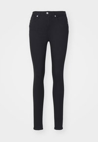 Sorte denim skinny jeans med en tettsittende design, fire lommer og metallbeslag i livet. Glatt tekstur uten synlige mønstre.