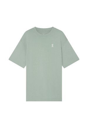 Maglietta verde chiaro a maniche corte con scollo rotondo e piccolo logo bianco "on" sul petto a sinistra, design semplice.