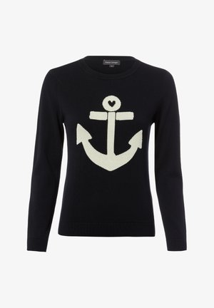 Schwarzer Pullover mit langen Ärmeln und großem weißem Anker-Design, das oben in der Mitte der Brust eine herzförmige Aussparung aufweist.