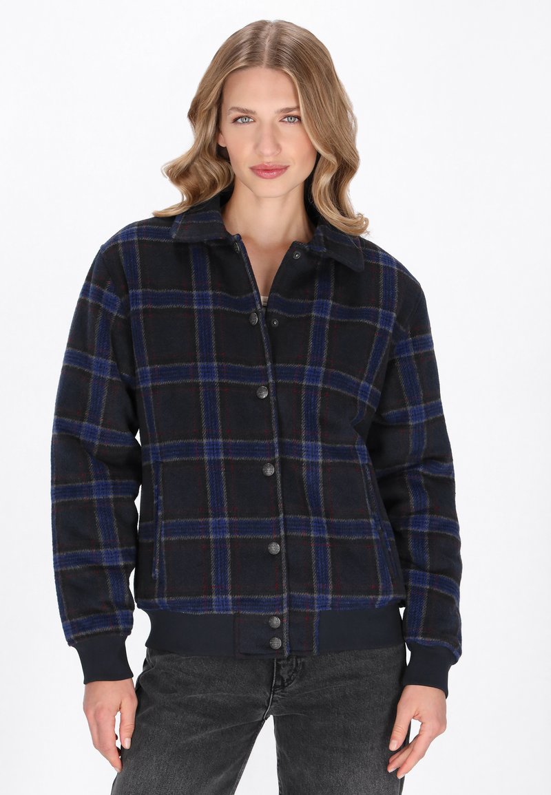 Knapp-up rutigt jacka som har ett mönster i marinblått, blått och rött, tillverkad av ett mjukt material, med krage och ribbade cuffs och nederkant.