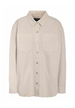 Beige skjorte med knapper foran, krage, to lommer foran og lange ermer. Laget av et mykt, teksturert stoff med metalliske knapper.