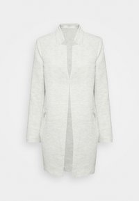 Vaaleanharmaa avonainen takki, jossa on teksturoitu kudos, pitkät hihat ja sivutaskut. Takissa on minimalistinen muotoilu ja kaulaton pääntie.