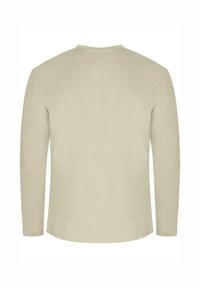 Langärmliges T-Shirt aus hellbeigem Baumwollstoff. Verfügt über einen Rundhalsausschnitt und einen abgerundeten Saum mit minimalen Nähdetails. Keine Grafiken oder Muster.