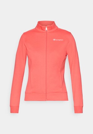 Koraalroze zip-up jack met staande kraag, lange mouwen, twee zijzakken en een wit Champion-logo op de bovenste linkerkant van de borst.