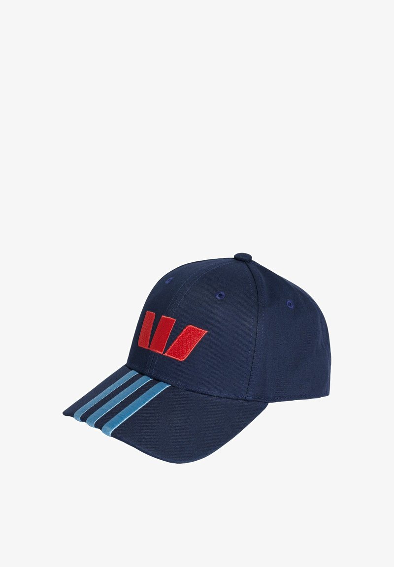 Mornarica kapa s crvenim logom, četiri plave pruge na viziru i gumb na vrhu. Izrađena od tkanine glatke teksture. Podesivog je kroja.