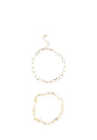 Gold-tone metal chain bracelet with elongated links and adjustable clasp, paired with a beaded bracelet made of cream-colored stones.