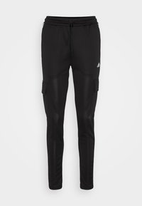 Svarta sweatpants med dragsko i midjan, två sidofickor och smal passform. Tillverkade av ett mjukt, andningsbart material.