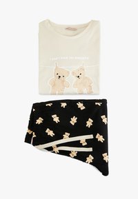 Satin pyjamasæt bestående af en cremefarvet skjorte med bjørne grafik og sorte shorts med spredt bjørneprint. Elastisk talje med snøre.