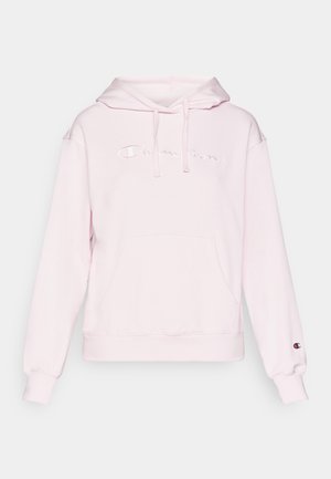 Pink hooded sweatshirt made of soft fabric with a kangaroo pocket. Features embroidered "Champion" logo and ribbed cuffs for a snug fit.