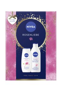NIVEA Rosenliebe gift set with two white bottles: shower cream and body lotion. Packaging features pink, gold, and blue with floral accents.