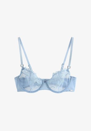 Reggiseno azzurro chiaro trasparente con ricamo floreale, coppe con ferretto e spalline regolabili su sfondo bianco.