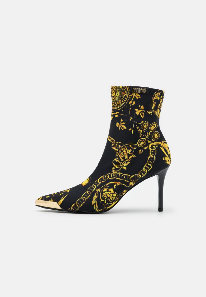 stivaletti versace