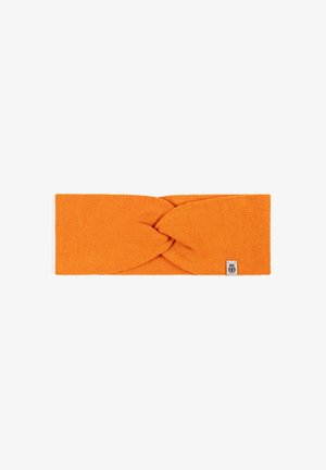 Orange knitted headband with a twisted design in the center and a small logo patch on one side. Soft texture and solid color.
