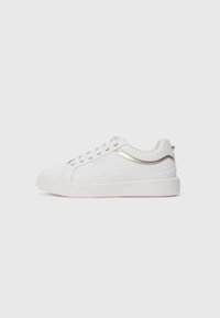 Unselected, bianco ottico/oro