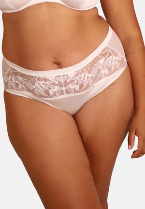 Woman wearing light pink lace and satin underwear, showing midsection and upper thighs against a plain background.