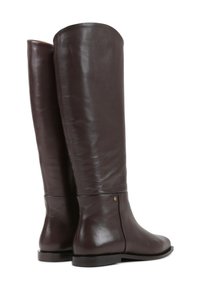 Knee-high brown leather boots with a smooth texture, rounded toe, minimalistic design, and a small gold accent near the sole.