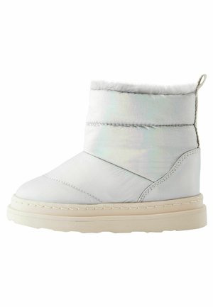 Botte d'hiver blanche matelassée jusqu'à la cheville avec doublure en fourrure, semelle beige et languette à l'arrière, conçue pour le temps froid.