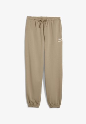 Pantaloni de trening bej cu șnur la talie și manșete elastice, confecționați dintr-un material moale; au un logo alb Puma pe coapsa stângă.
