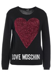 Pull noir avec un grand cœur rouge pailleté sur le devant, avec "LOVE MOSCHINO" en texte blanc en bas. Coupe standard.