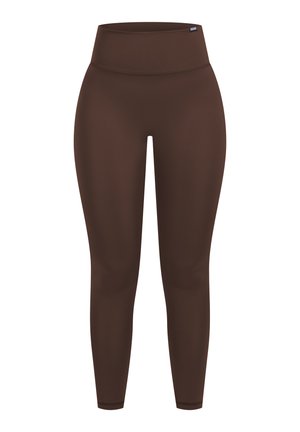 Nahtlose, braune Sportleggings mit hohem Bund und kleinem Logotag am Taillenbund, entwickelt für Dehnbarkeit und Komfort.