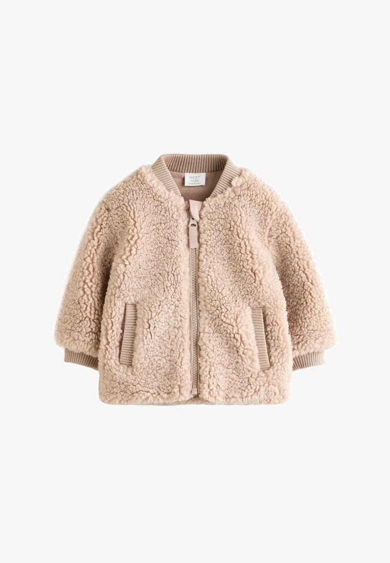Soft beige baby jacket with textured fleece fabric, ribbed collar, cuffs, two front pockets, and front zipper closure.